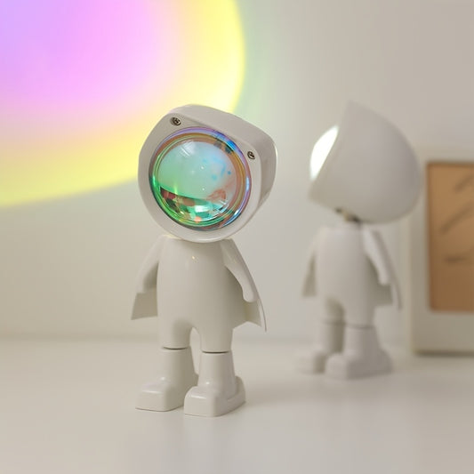 •	Lampă decorativă astronaut cu proiecție de apus curcubeu